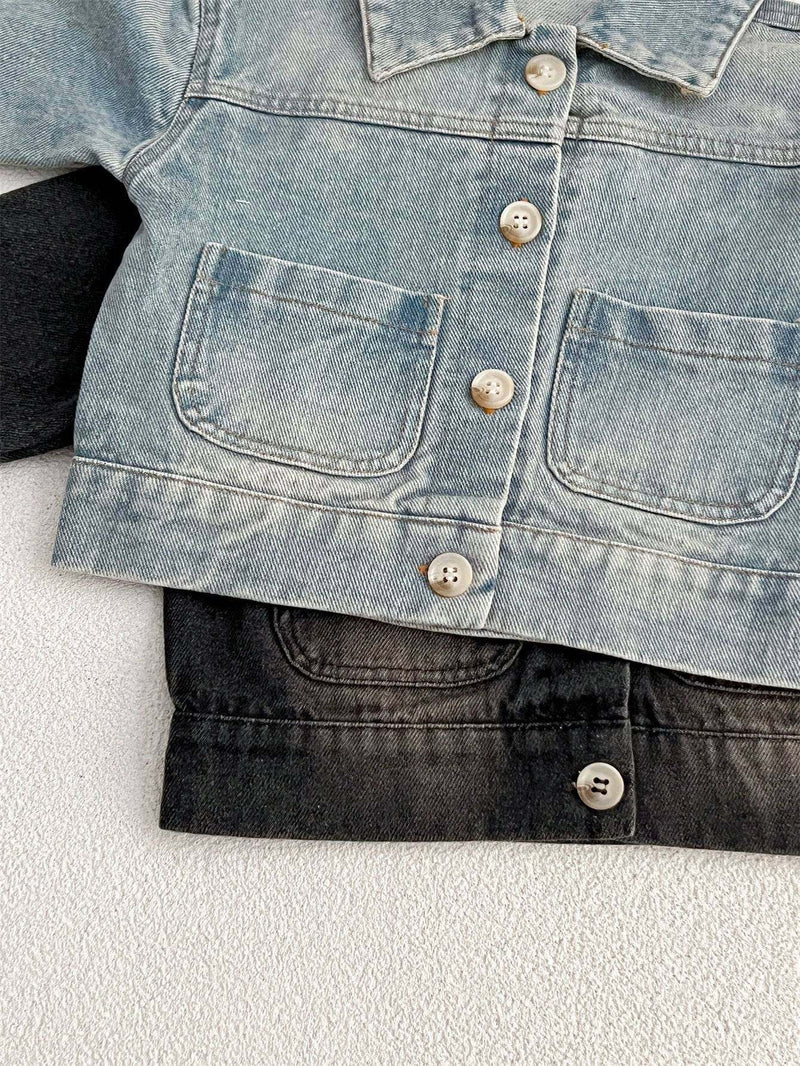 Kids button front washed style denim jacket with classic design and sturdy fabric.