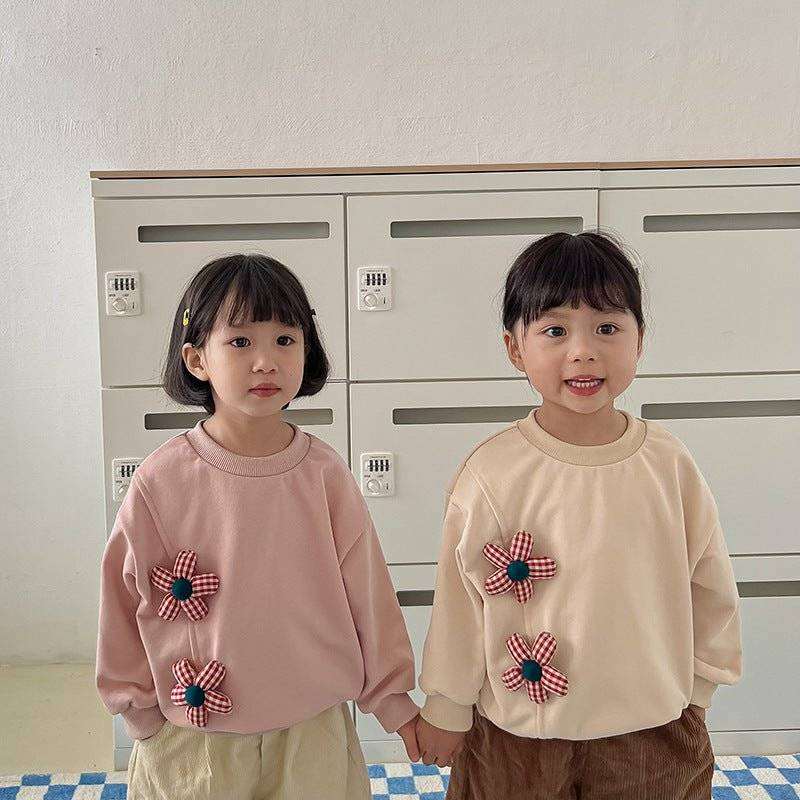 Kids / GirlsExpertly crafted with a cotton blend, this Kids / Girls Crew Neck Long Sleeves top features a delightful 3D flowers pattern in shades of pink, yellow, and beige, perEveretts Place: Online Boutique 