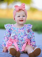 Long sleeve baby girl romper with unicorn floral print and ruffle bows