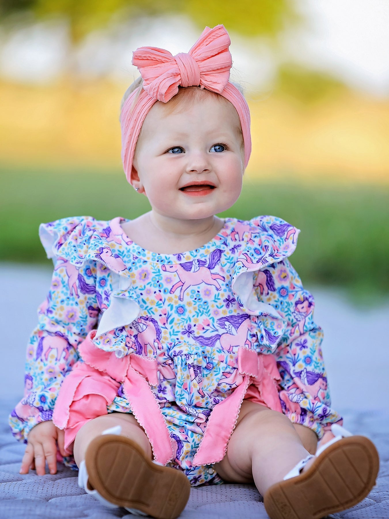 Long sleeve baby girl romper with unicorn floral print and ruffle bows