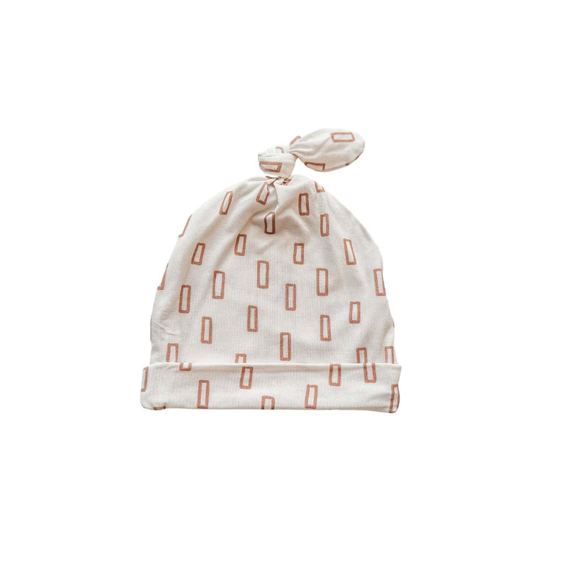 Neutral rectangle baby knot hat made of bamboo and spandex, suitable for newborns to 3+ months.