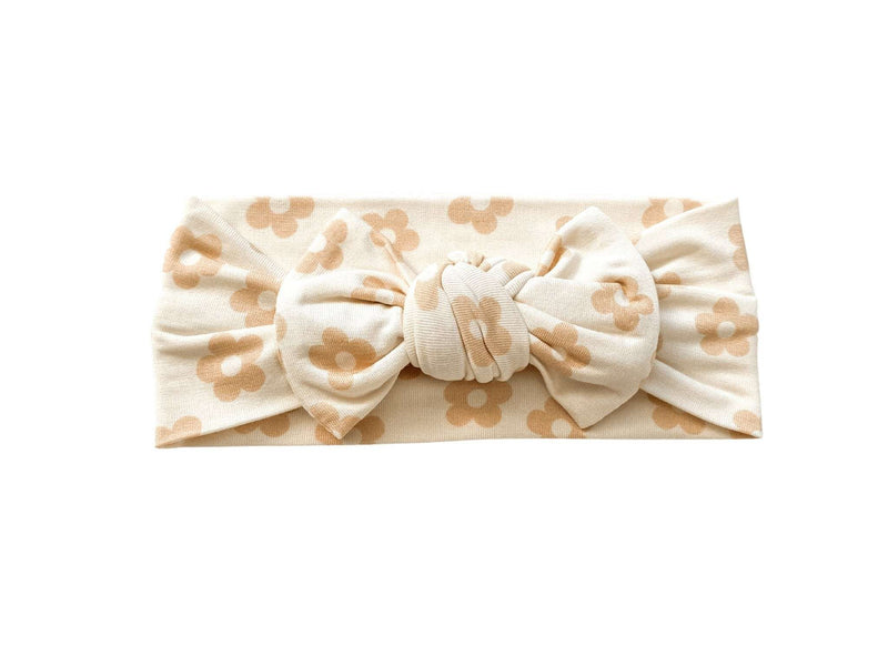 Blush Daisy knotted baby gown made from soft bamboo viscose with a floral pattern.