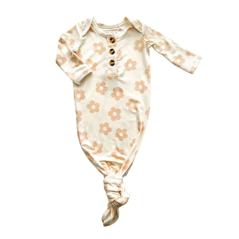 Knotted baby gown in blush daisy print, bamboo viscose material, fold-over cuffs, knotted bottom, size 0-3 months.