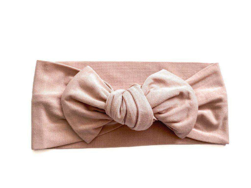 Dusty pink knotted baby gown made from soft bamboo viscose material.