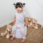 Two-piece short sleeve pajama set with a koi fish print, showing matching top and pants.
