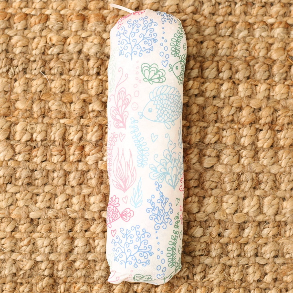 Baby swaddle blanket with a koi fish print, spread flat to show the pattern