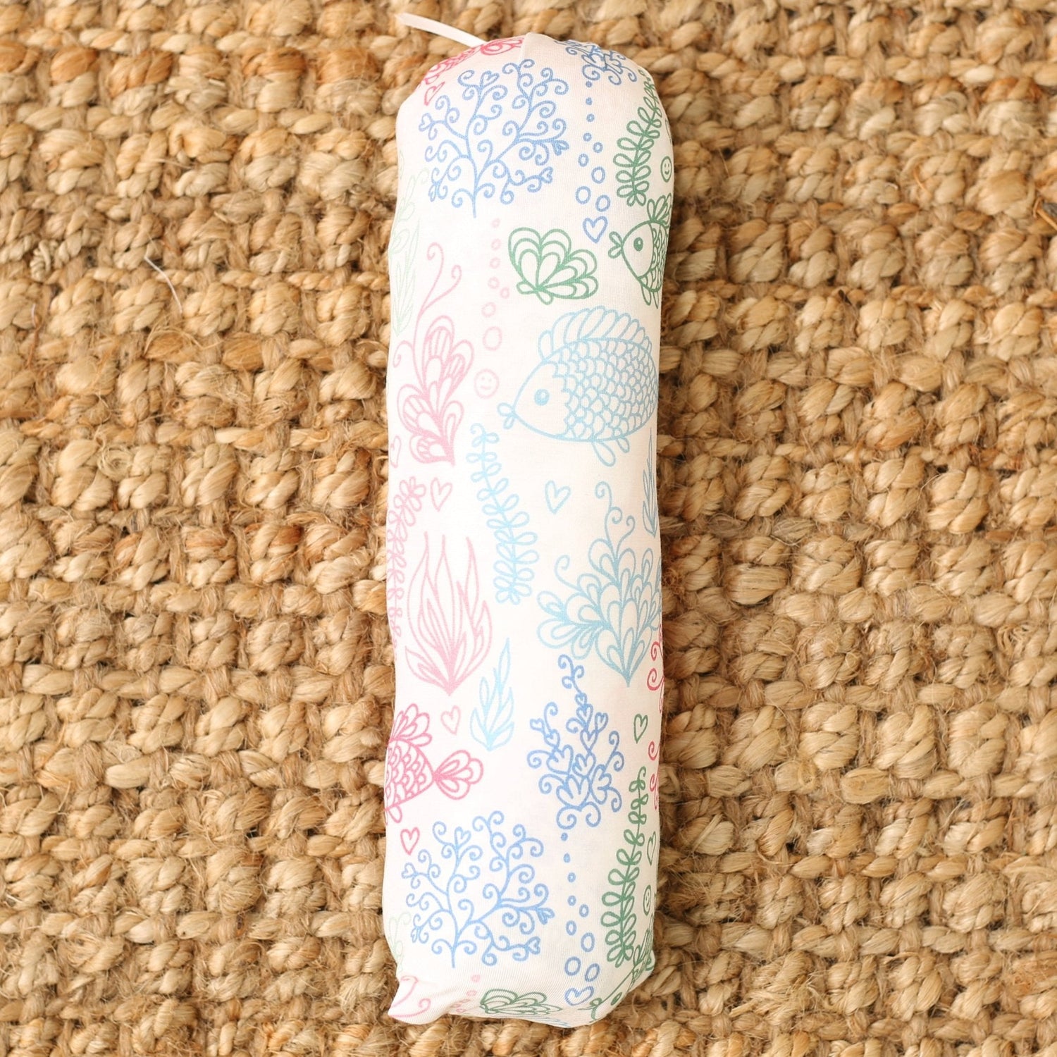 Baby swaddle blanket with a koi fish print, spread flat to show the pattern