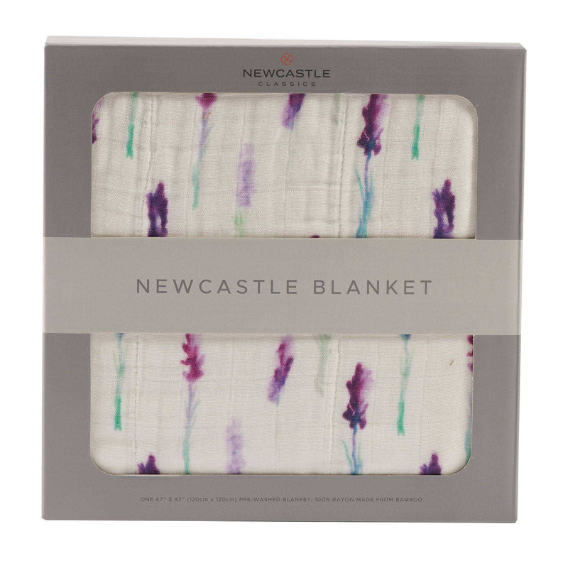 Lavender and white Newcastle blanket in packaging with floral design, made of natural bamboo muslin.