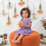Lavender short-sleeve A-line toddler dress with a flared twirl skirt