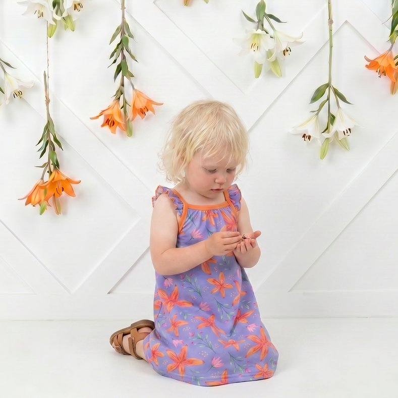 Lavender Leilani Flutter Sleeve Dress by Bestaroo