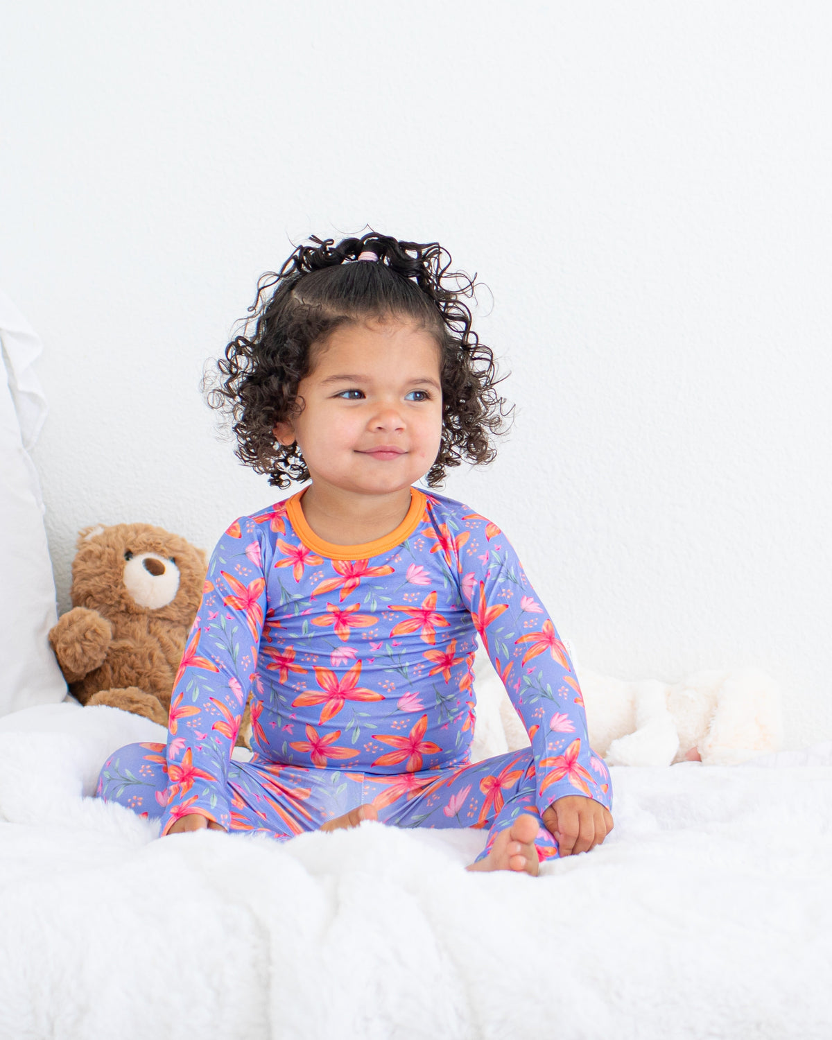 Two-piece baby pajama set with lavender Leilani print, long sleeve top and matching pants