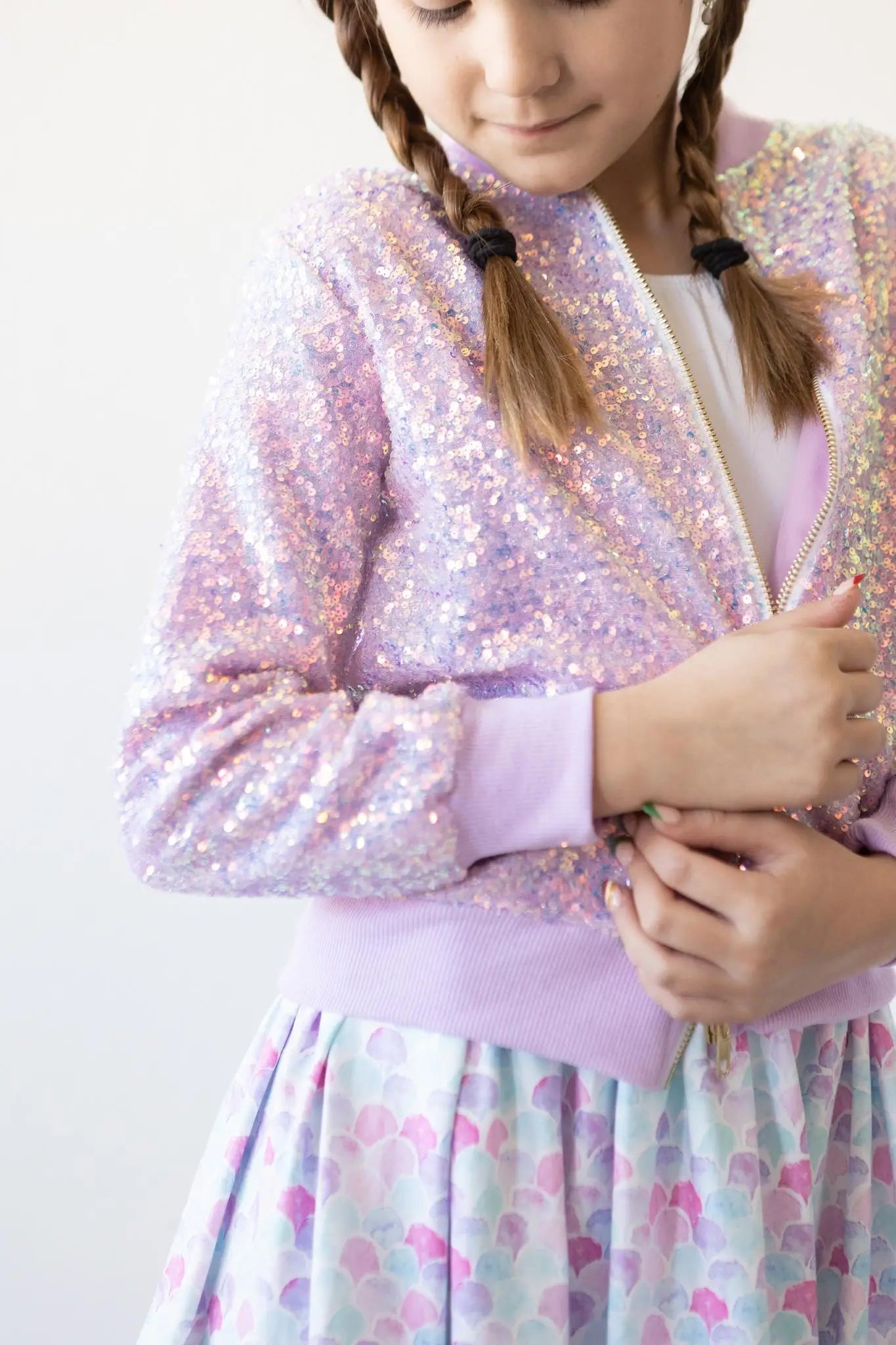 Lavender sequin jacket for girls with long sleeves and all-over sparkle finish.