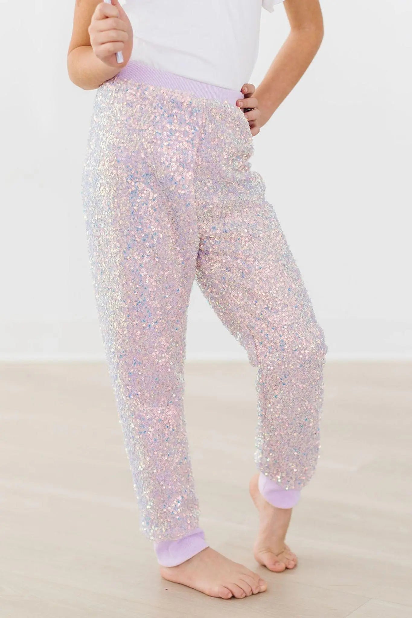 Lavender sequin joggers with elastic waist and cuffed ankles for girls