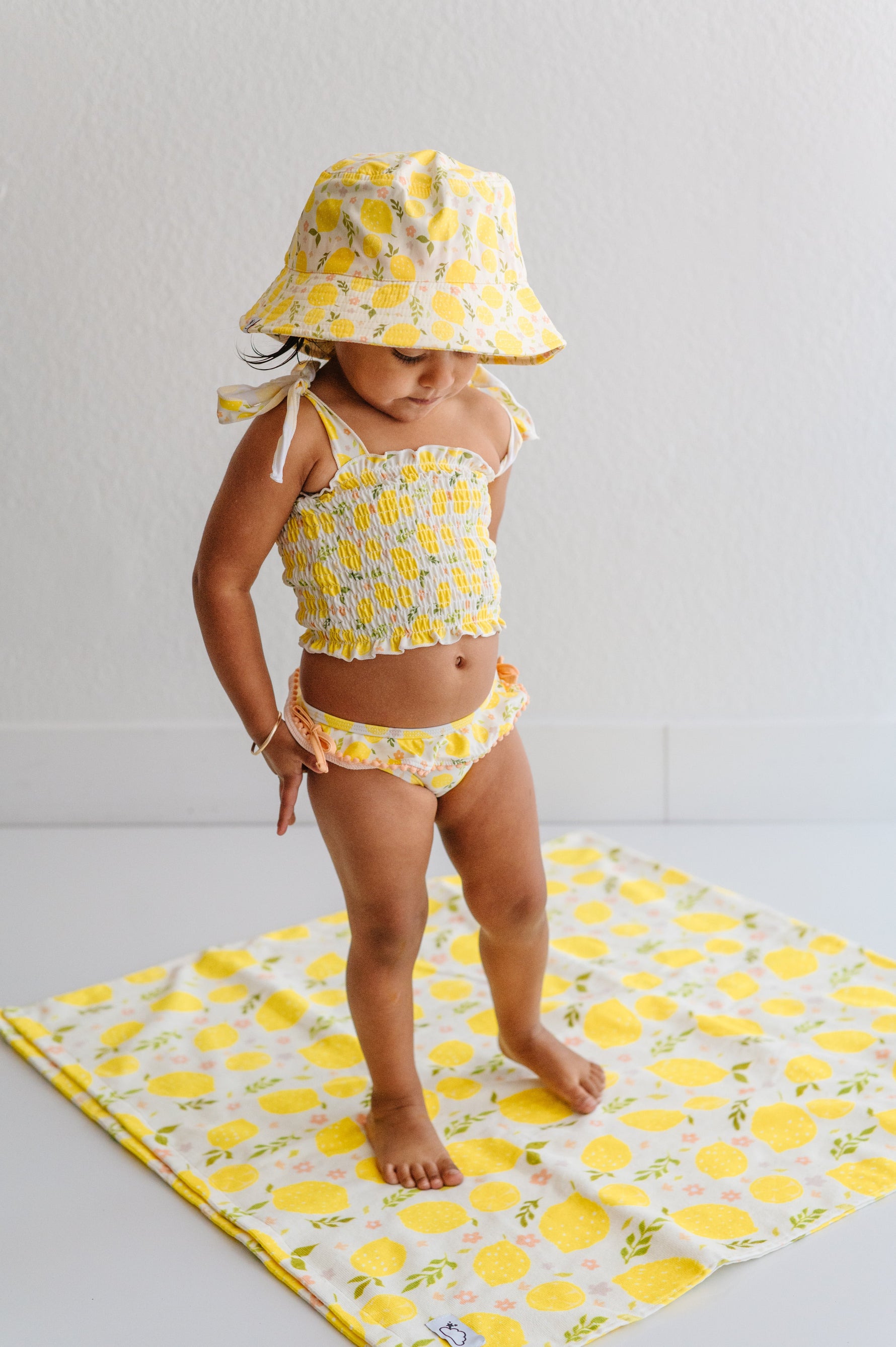 DREAM BIG LITTLE CO LEMON BLOSSOMS DREAM SMOCKED TANKINI TWO PIECE SWIM SUITEveretts Place