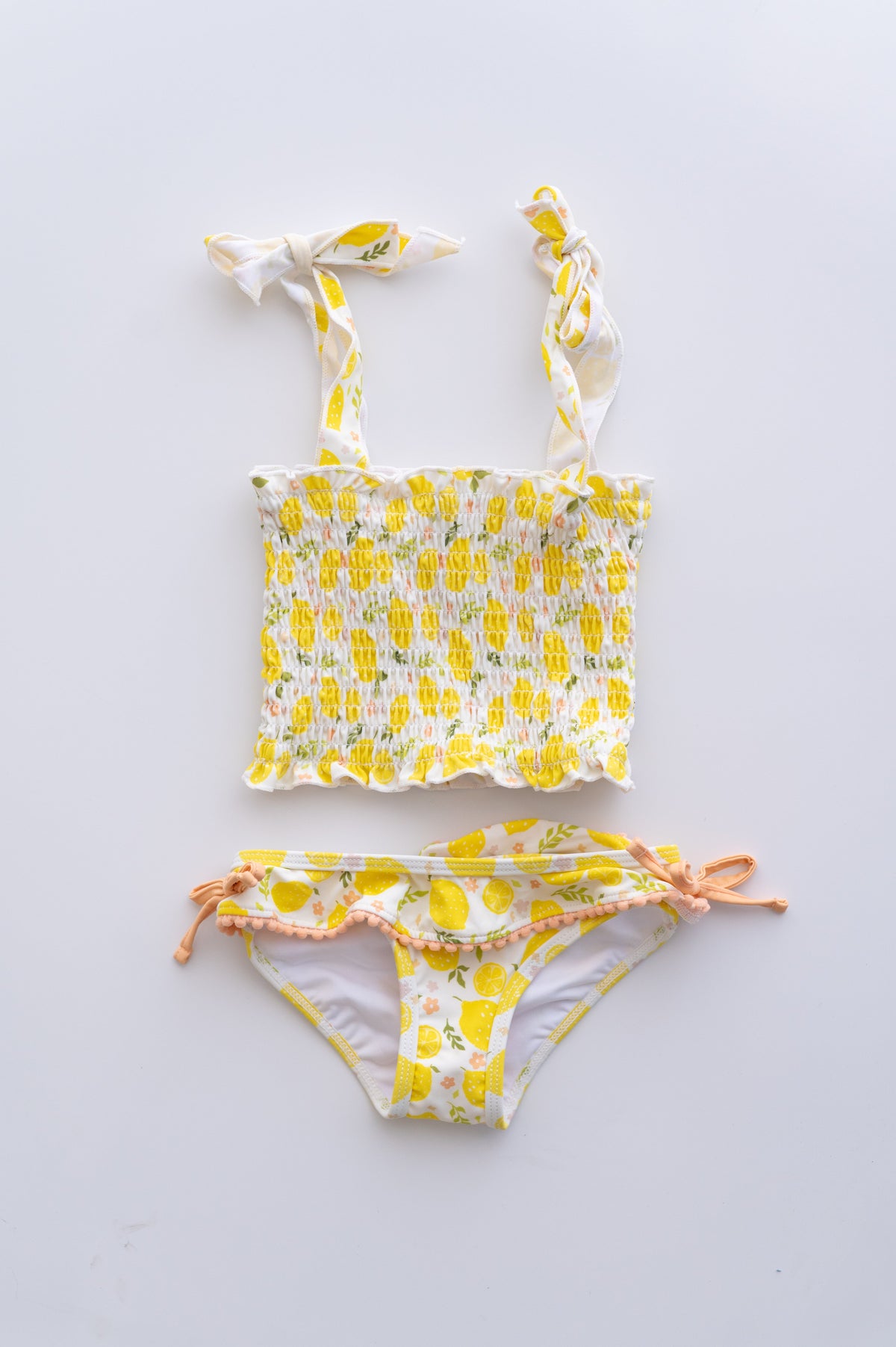 DREAM BIG LITTLE CO LEMON BLOSSOMS DREAM SMOCKED TANKINI TWO PIECE SWIM SUITEveretts Place