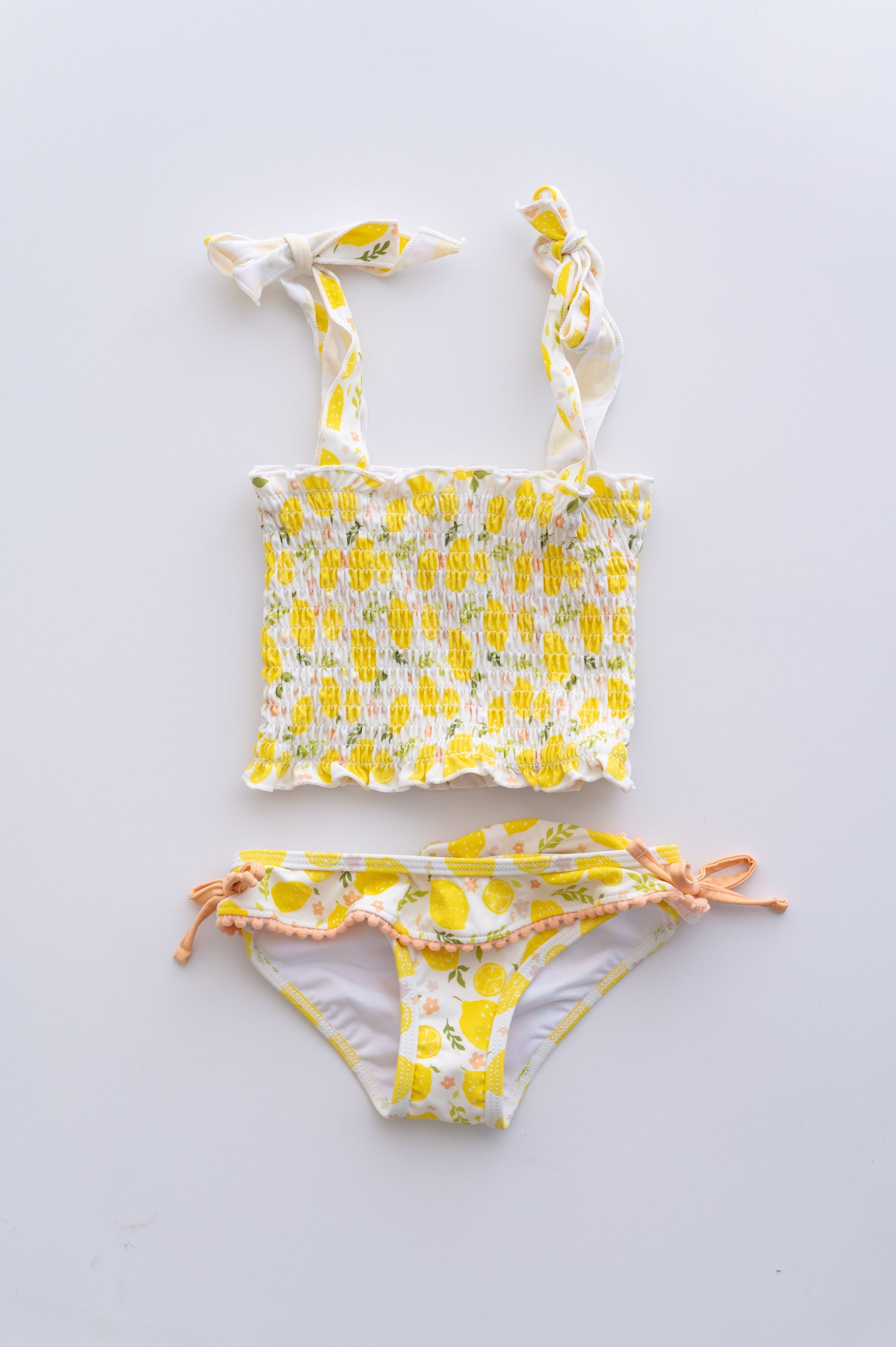 DREAM BIG LITTLE CO LEMON BLOSSOMS DREAM SMOCKED TANKINI TWO PIECE SWIM SUITEveretts Place