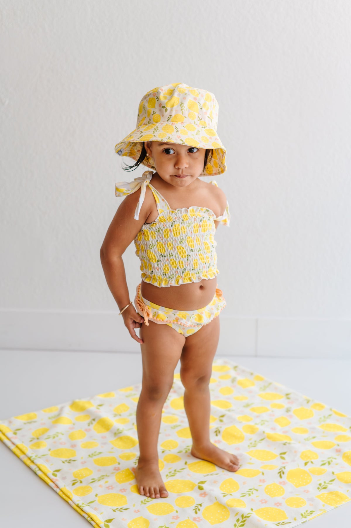 DREAM BIG LITTLE CO LEMON BLOSSOMS DREAM SMOCKED TANKINI TWO PIECE SWIM SUITEveretts Place