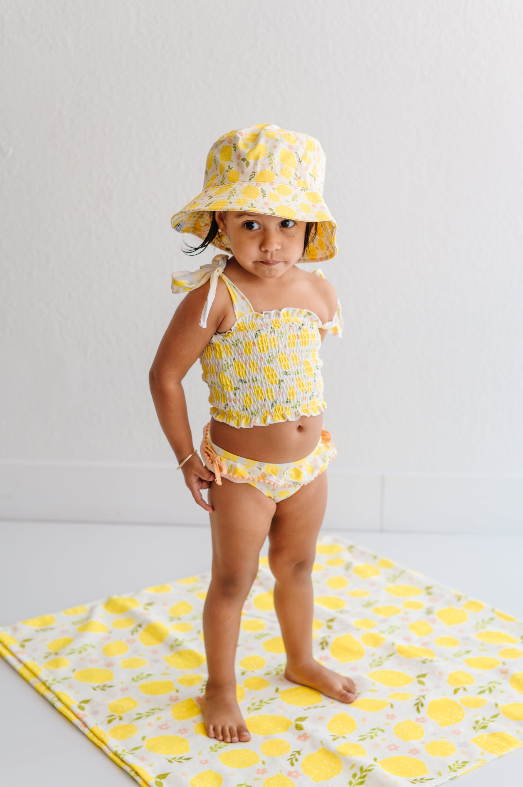 DREAM BIG LITTLE CO LEMON BLOSSOMS DREAM SMOCKED TANKINI TWO PIECE SWIM SUITEveretts Place
