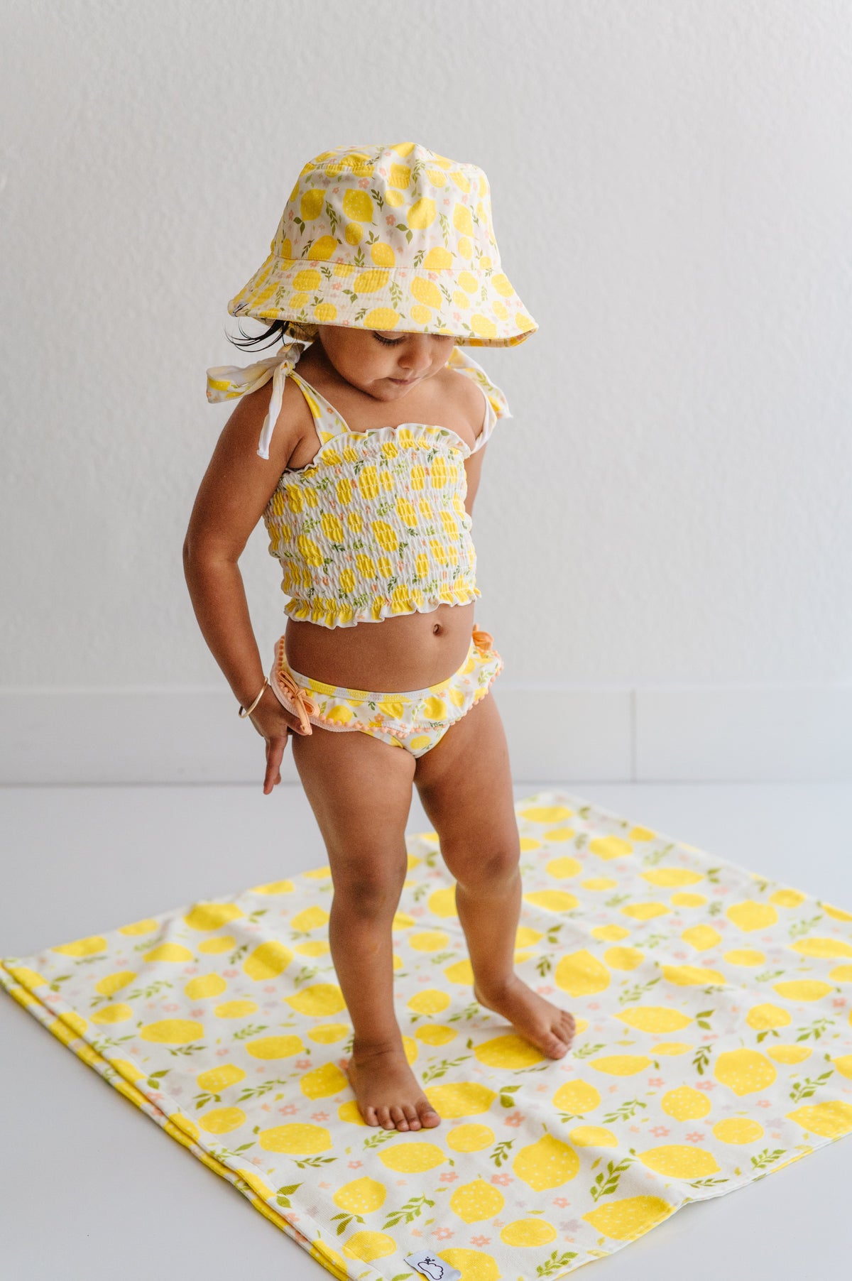 DREAM BIG LITTLE CO LEMON BLOSSOMS DREAM SMOCKED TANKINI TWO PIECE SWIM SUITEveretts Place