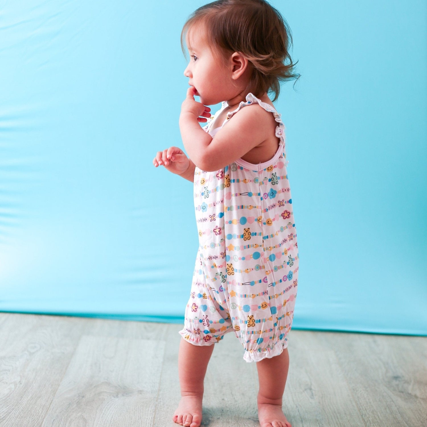 Bubble romper with flutter sleeves and snaps at the legs for babies