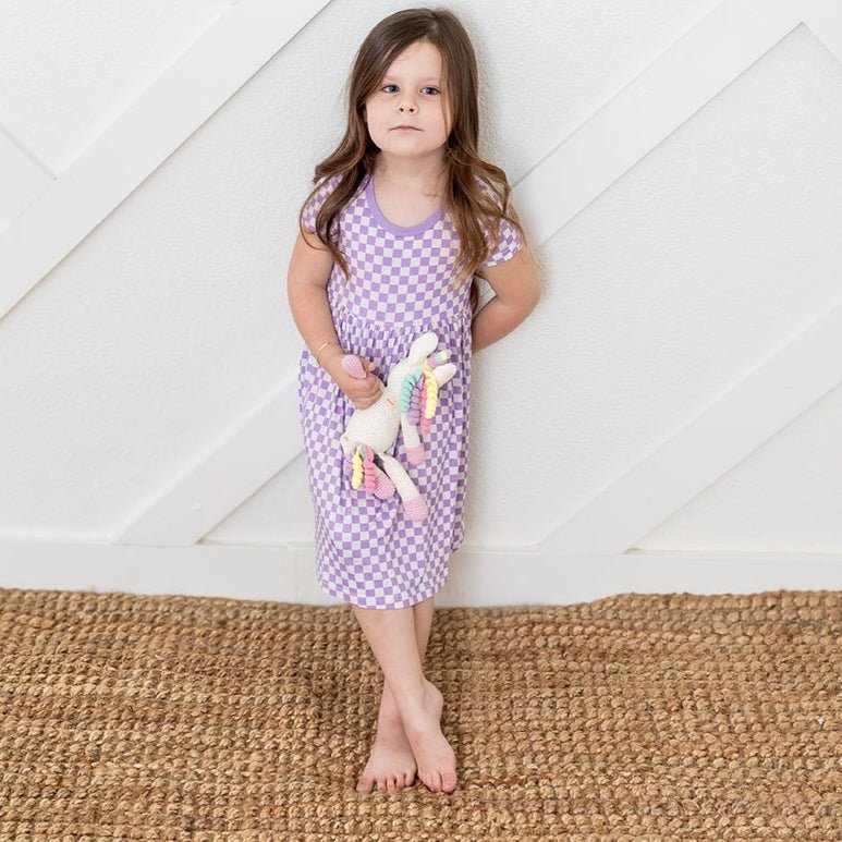 Short-sleeve toddler dress in a lilac and white checked pattern with a full twirl skirt