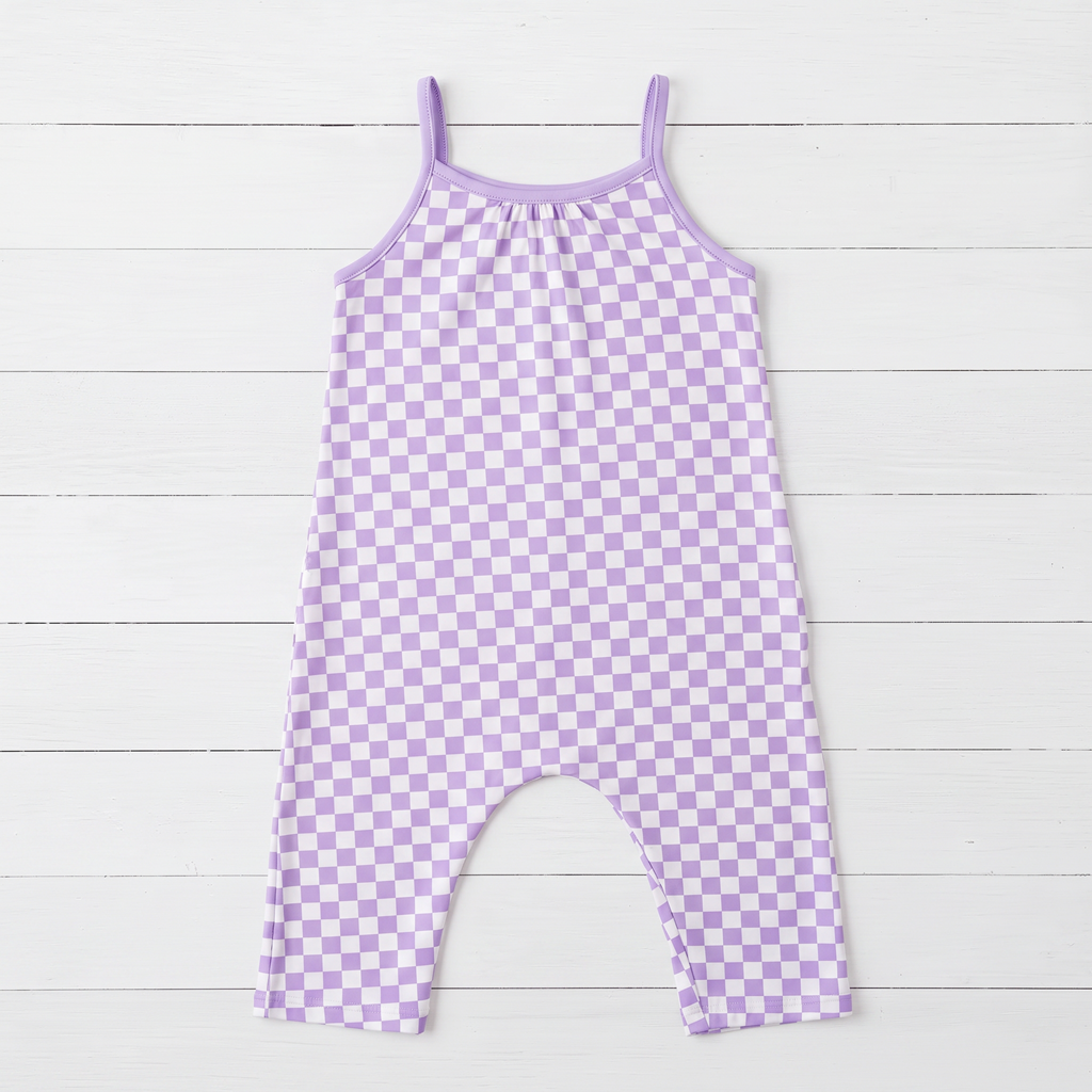 Sleeveless baby jumpsuit in lilac check print with two front pockets