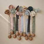 Mushie Linen Pacifier Clip Two Pack with Water Resistant Coating and Faux Wood Silicone Clasp - 