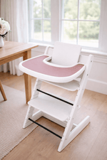 Little Joy Co. BPA-free silicone placemat on a Stokke Tripp Trapp highchair tray, ready for feeding.