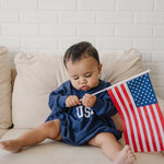 Little Joy Co. USA ultra-soft terry sweatshirt romper for babies.