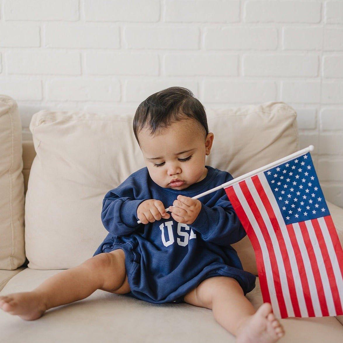 Little Joy Co. USA ultra-soft terry sweatshirt romper for babies.