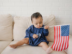 Little Joy Co. USA ultra-soft terry sweatshirt romper for babies.