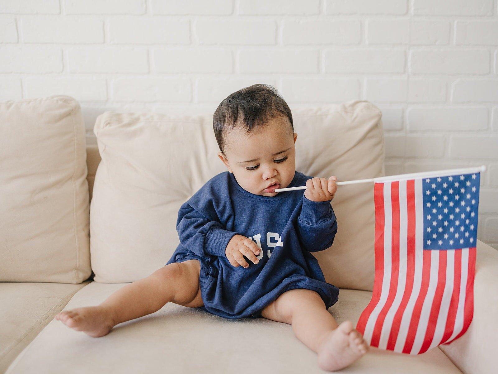 Little Joy Co. USA ultra-soft terry sweatshirt romper for babies.