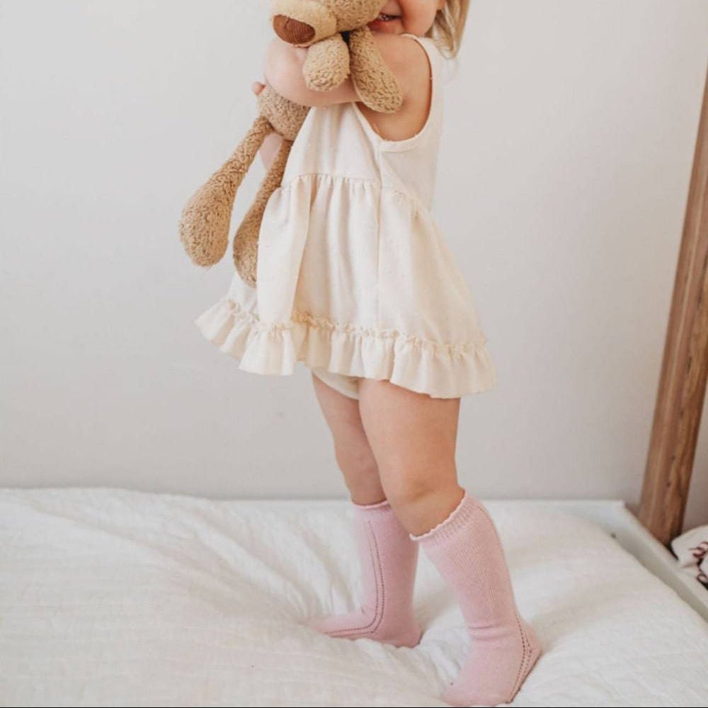 Little Love Bug Co. baby eyelet knee high socks, two pairs.