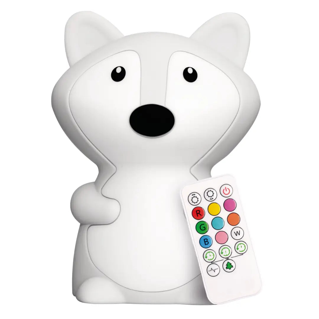 Fox-shaped silicone night light glowing softly, with rounded ears and a friendly face, sized for a child to hold.