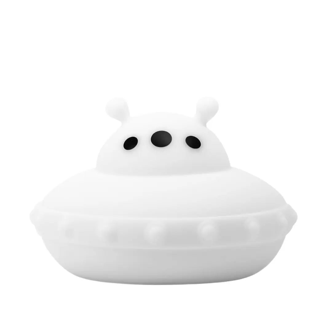 UFO-shaped silicone night light glowing in a bright color with tap controls on top