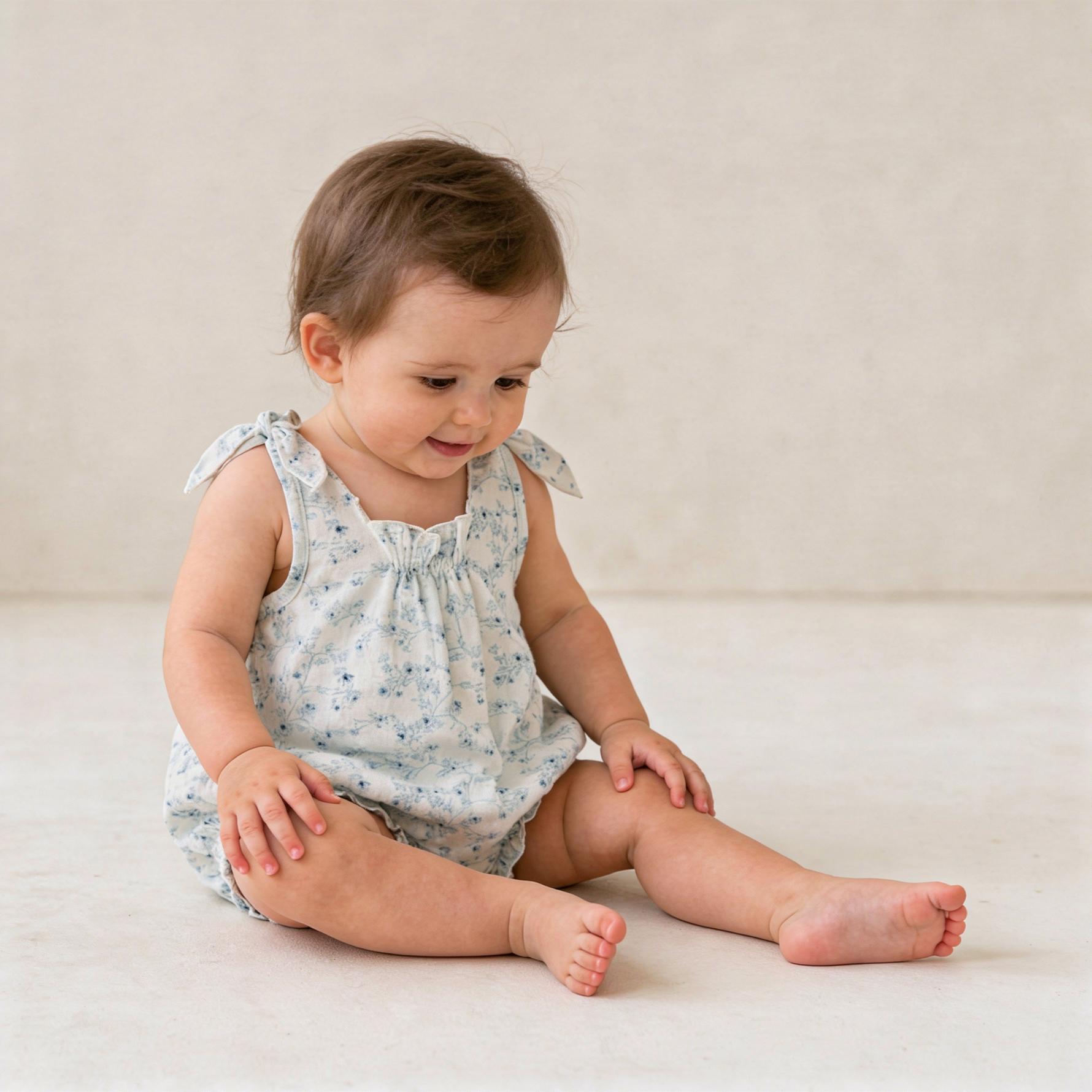 Organic Tie Shoulder Bubble Romper - Ivy Floral by Makemake Organics at Everetts Place