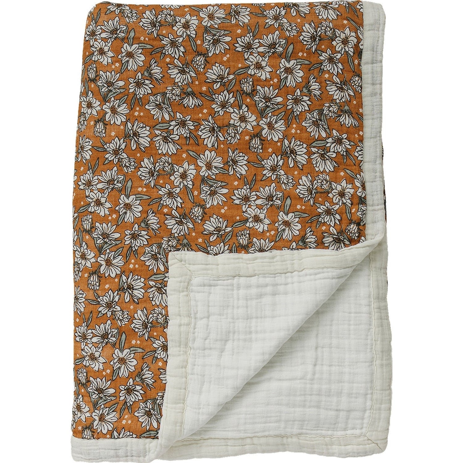 Twin muslin quilt with a magnolia floral pattern in soft muted tones, spread flat to show the design.