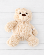 Marshmallow the Bear plush stuffed animal, a soft cream-colored teddy bear about 10 inches tall