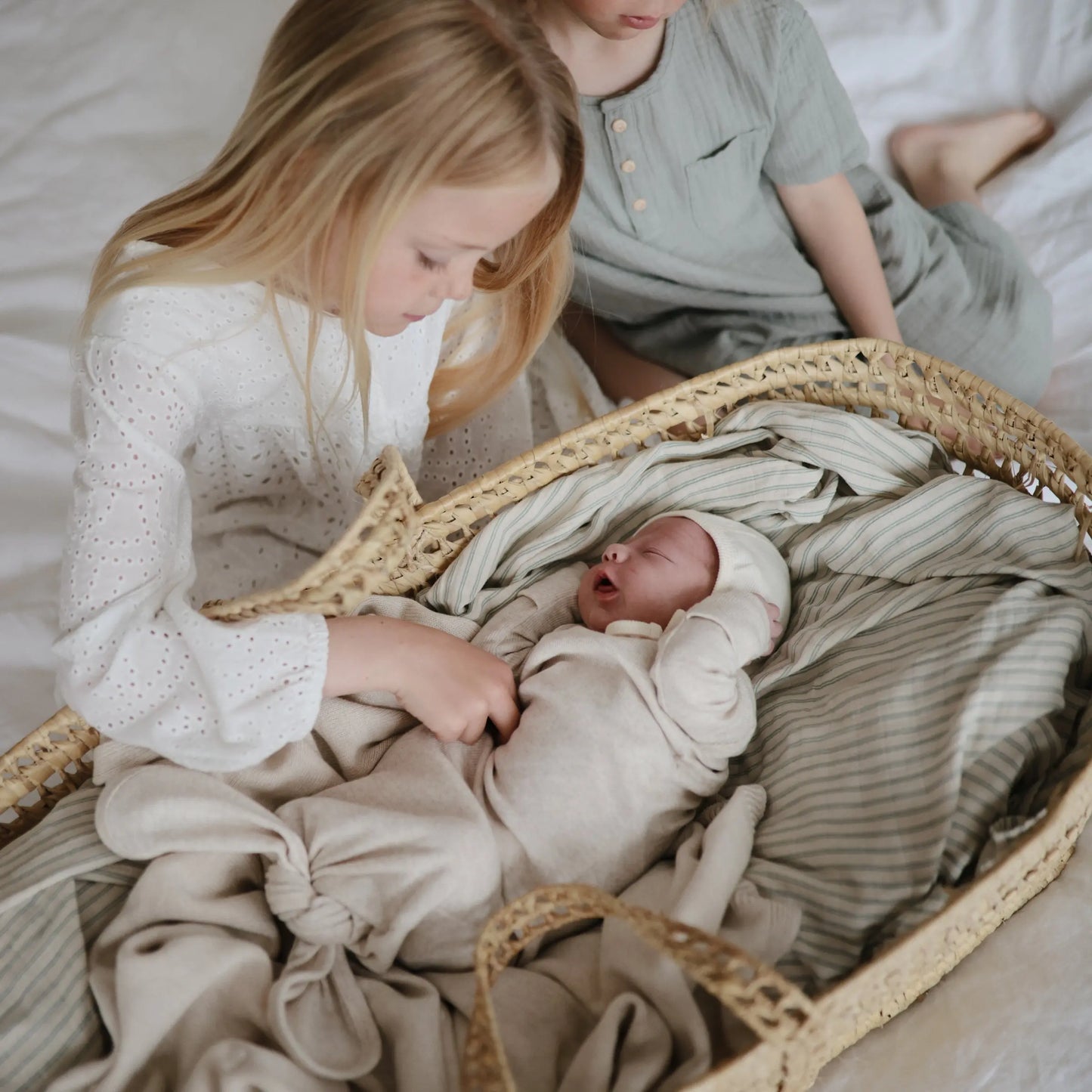 Organic Cotton Muslin Swaddle Blanket for Baby Cuddling and Nursing Mushie