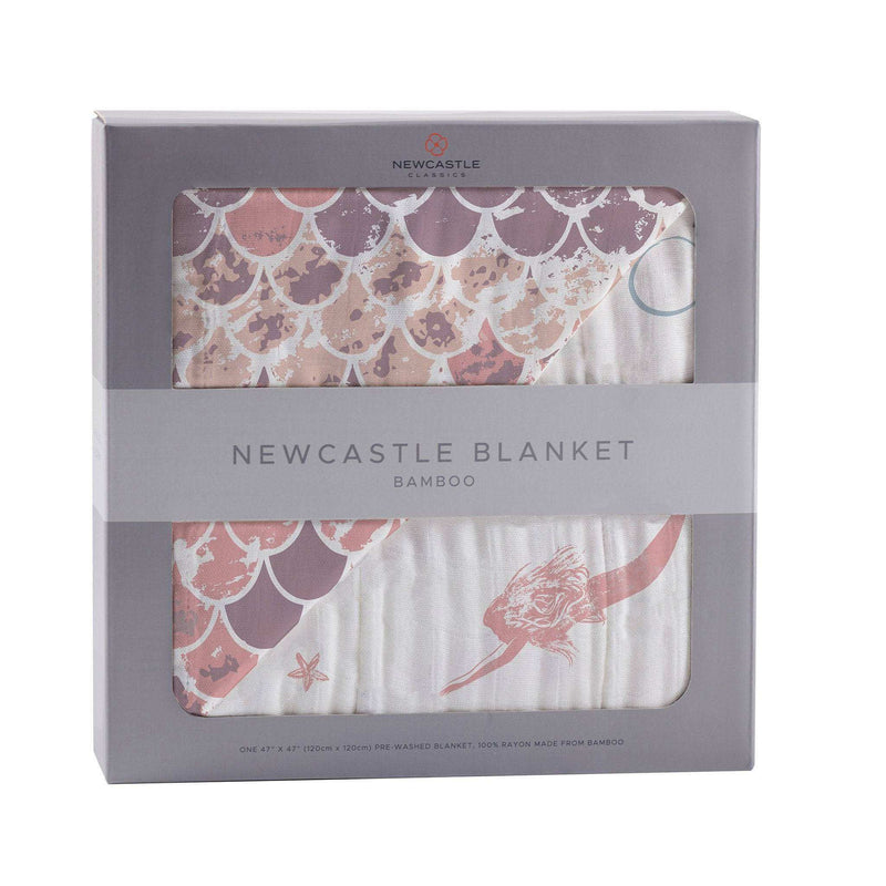 Mermaids and ScalesIndulge in the luxurious comfort of this four-layer, 100% natural bamboo muslin blanket. Its soft, breathable fabric is made from natural bamboo fibers, making it peEveretts Place: Online Boutique 