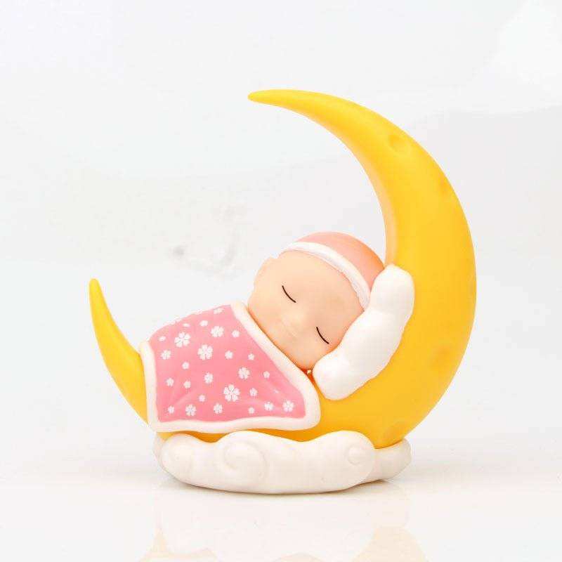 Micro-view Moon Decoration featuring sleeping baby on crescent moon, handmade charm, 10cm, yellow and pink colors.