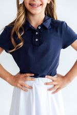 Navy S/S Ruffle Polo by Mila & Rose ®