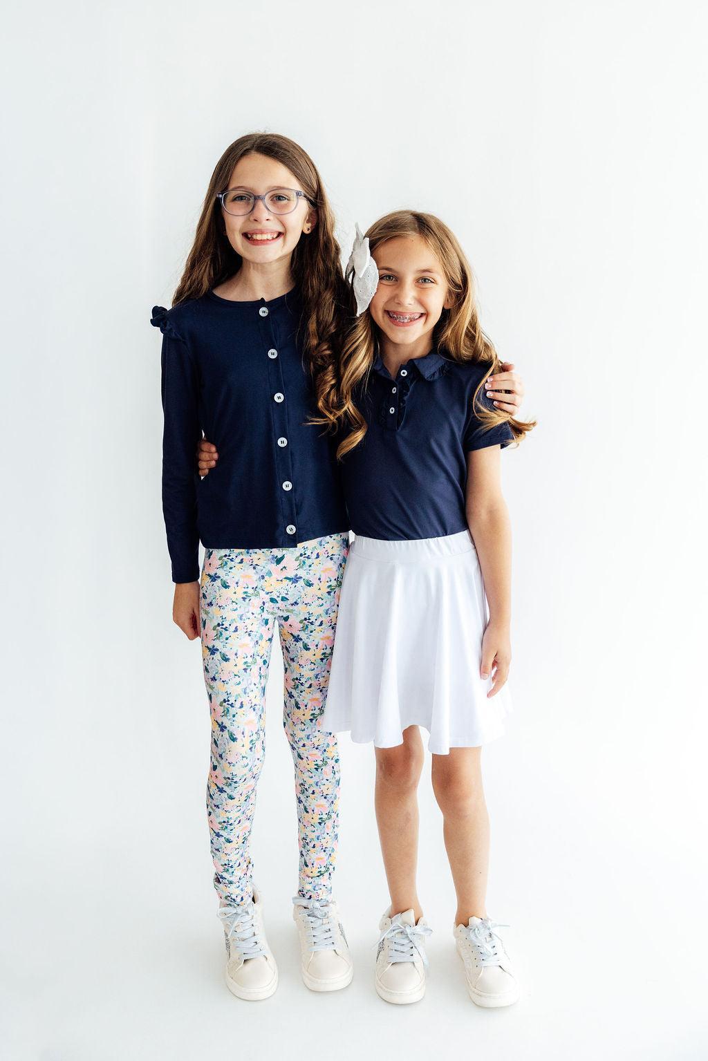 Navy S/S Ruffle Polo by Mila & Rose ®