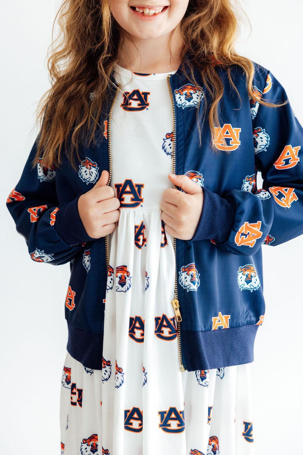 Blue satin bomber jacket for girls with Auburn University Aubie tiger spirit design.