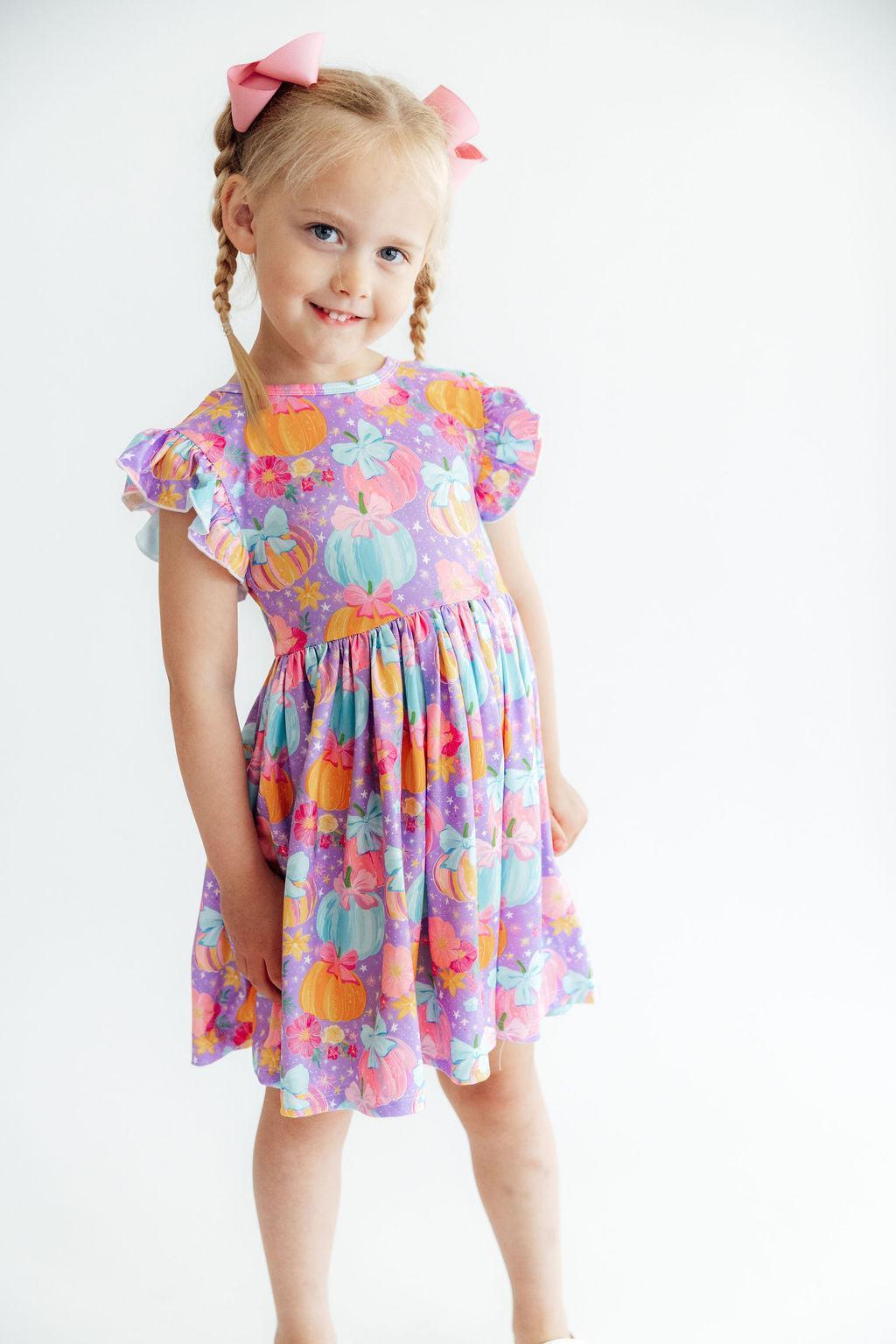 Flutter-sleeve twirl dress in autumn sparkle print with scoop back and short flutter sleeves