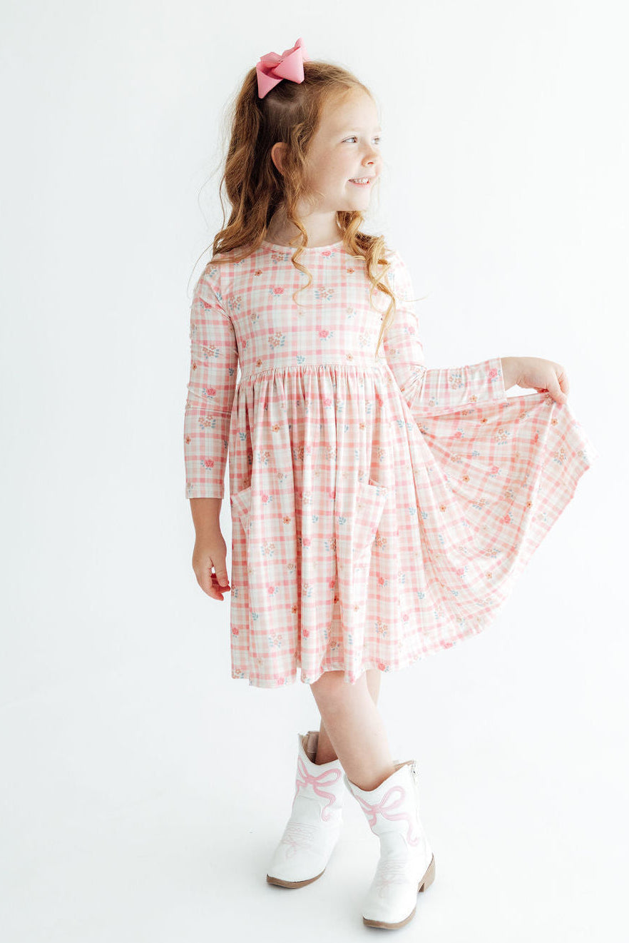 Long sleeve twirl dress in an Off the Grid print with pockets and a full-circle skirt