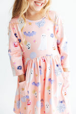 Twirl dress with 3/4 sleeves, pockets, and a spooky sweetheart Halloween print