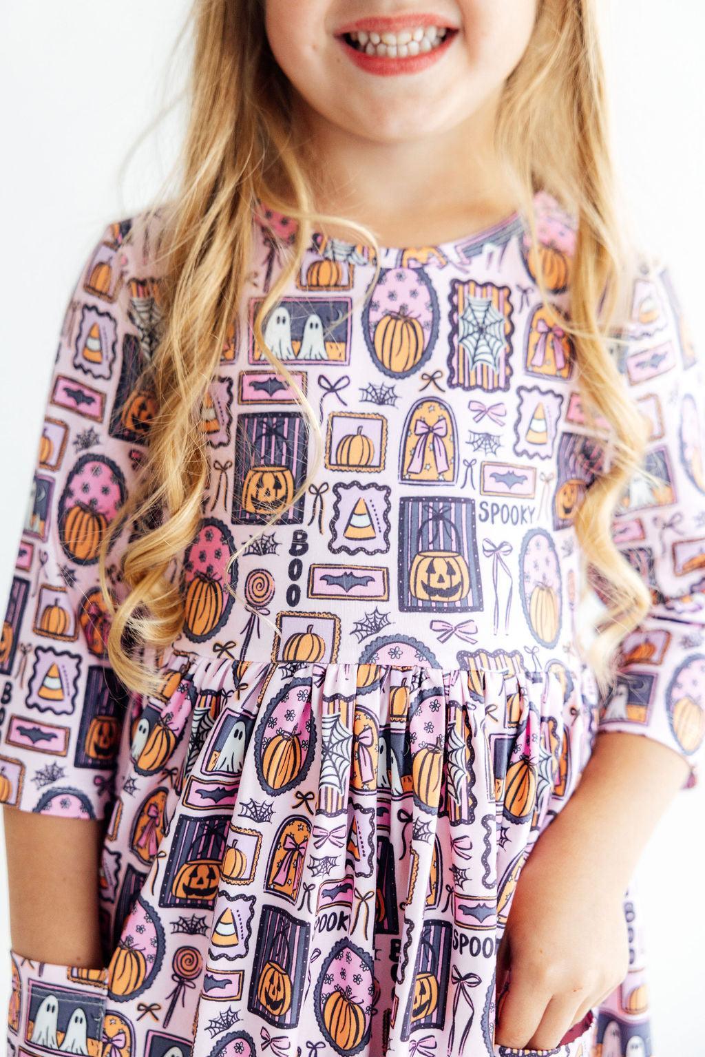 Twirl dress with 3/4 sleeves in a Ghouls Just Want to Have Fun ghost print with side pockets