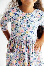 Twirl dress with fall floral print, 3/4 sleeves, ballet neckline, and full twirl skirt with pockets