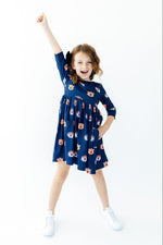 Auburn Blue Aubie twirl dress with 3/4 sleeves, pockets, and full spinning skirt